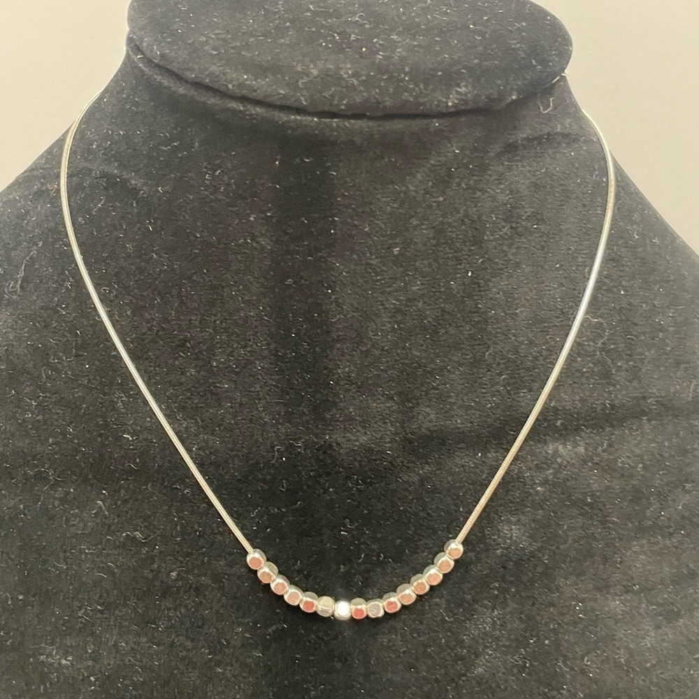 Necklace with small gold and silver tone beads. - Picture 2 of 3